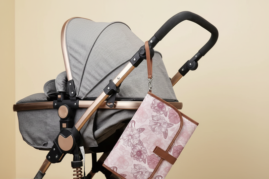 Changing pad on stroller in pastel yellow nursery